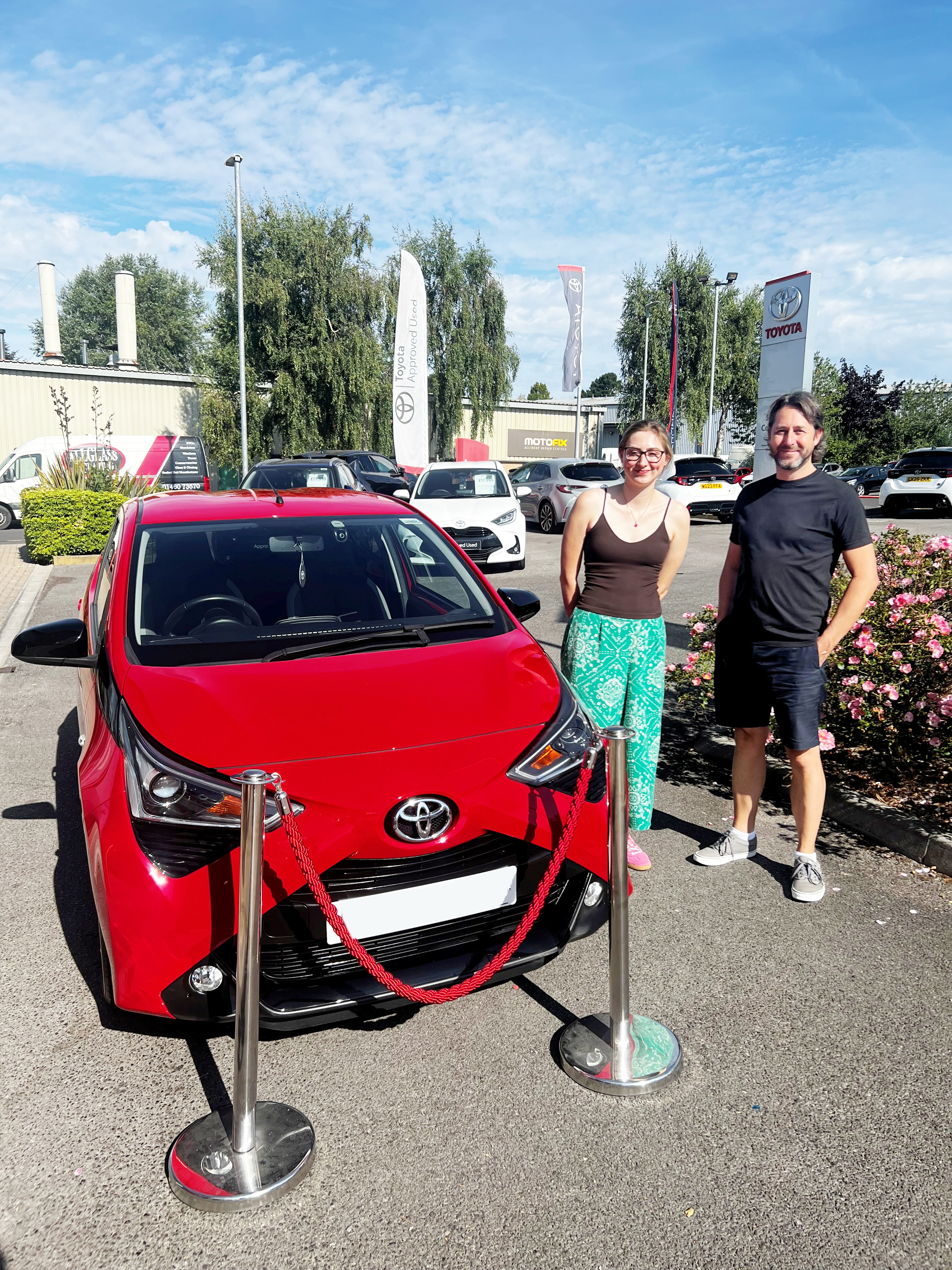 Abigail with her dad Justin collecting her Toyota Approved Used Aygo from SCC Toyota Yeovil